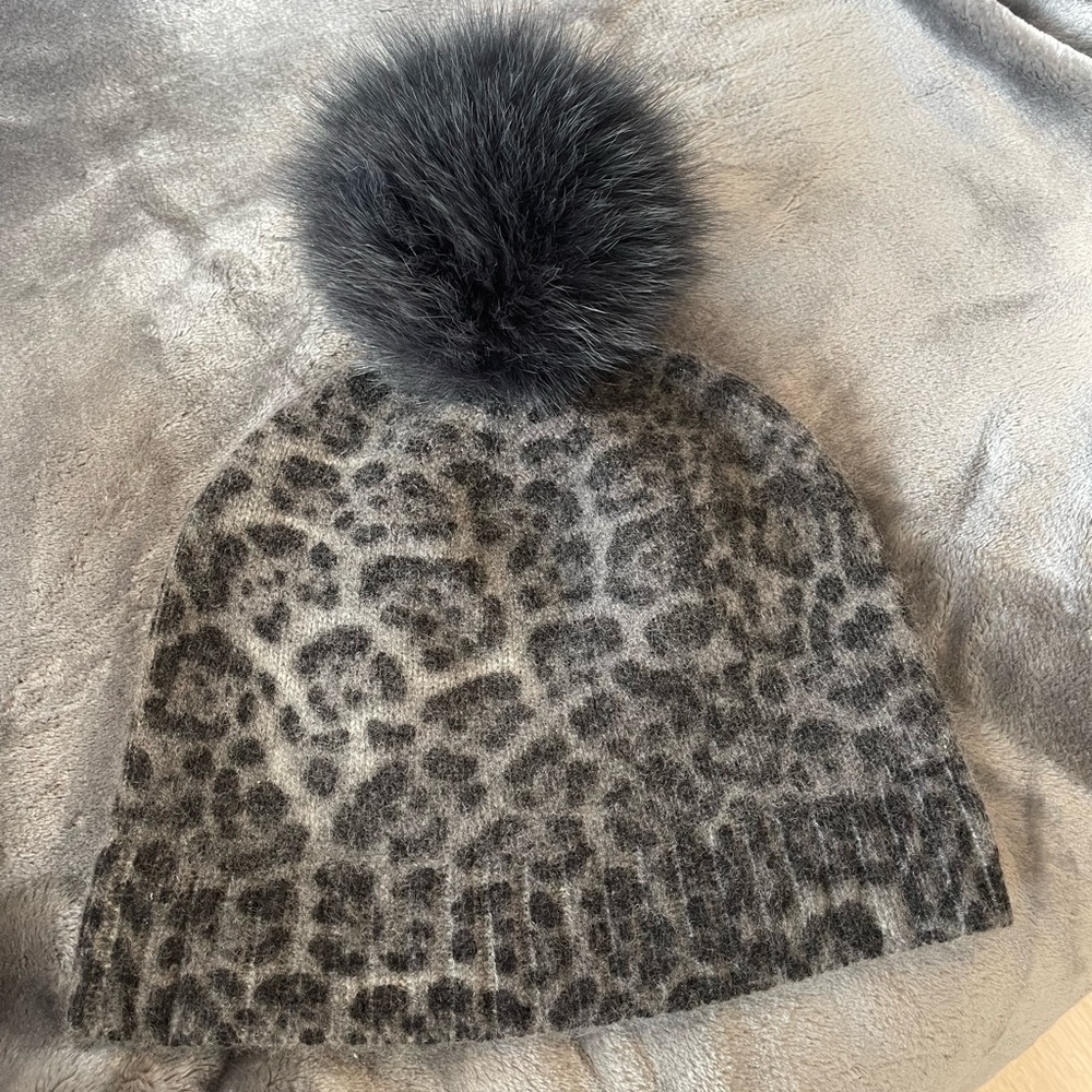 Beautiful, luminous cashmere cheetah print hat with fox pompon from Finland!